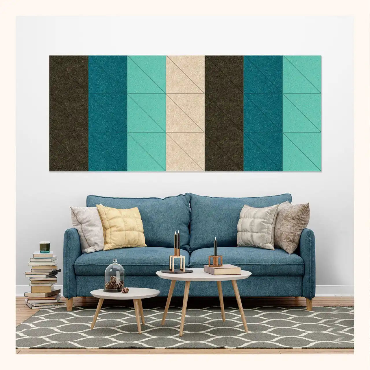 A set of modern wall panels featuring geometric patterns with shades of blue, beige, coffee, and teal, displayed on a wall above a blue couch and a wooden coffee table in a living room setting.