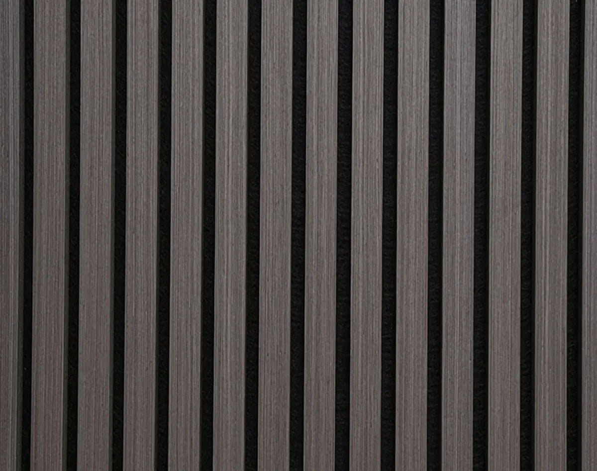 A close-up of a dark wood slatted panel with vertical grey wood strips and black gaps between them.