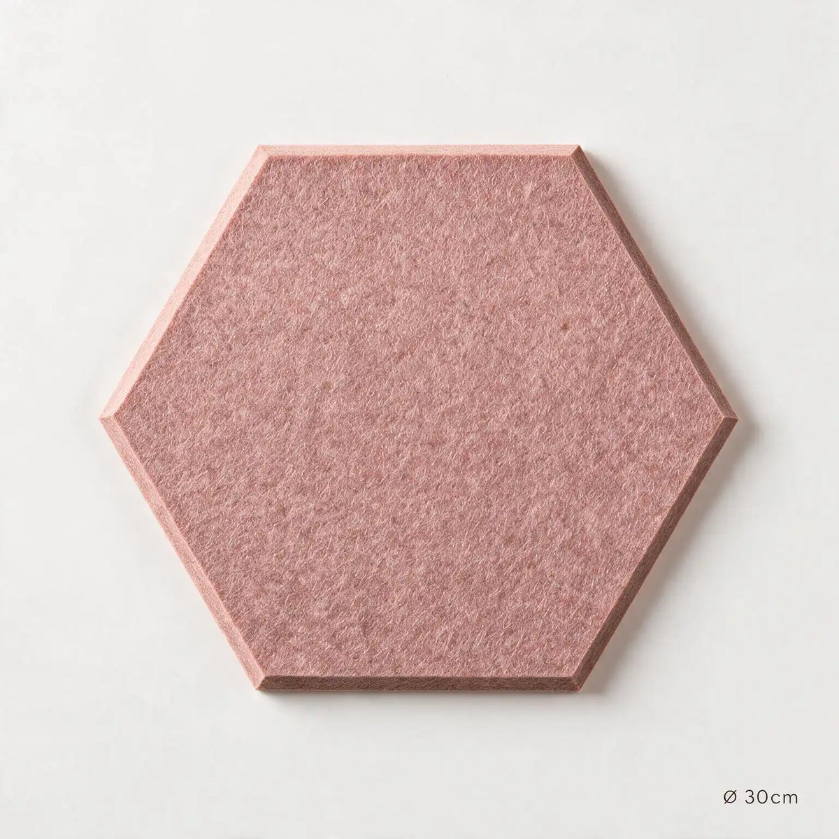 A hexagonal felt tile in a coral color with a light wood border, shown from a top-down perspective on a clean white background.