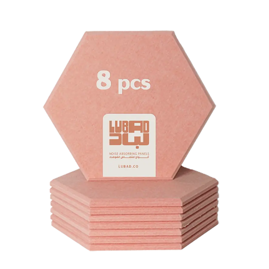 A stack of eight coral hexagonal noise-absorbing panels, with one panel standing upright on top. The top panel features the text '8 pcs' and a white square label with the Lubad 3W brand logo and 'NOISE ABSORBING PANELS' printed below.