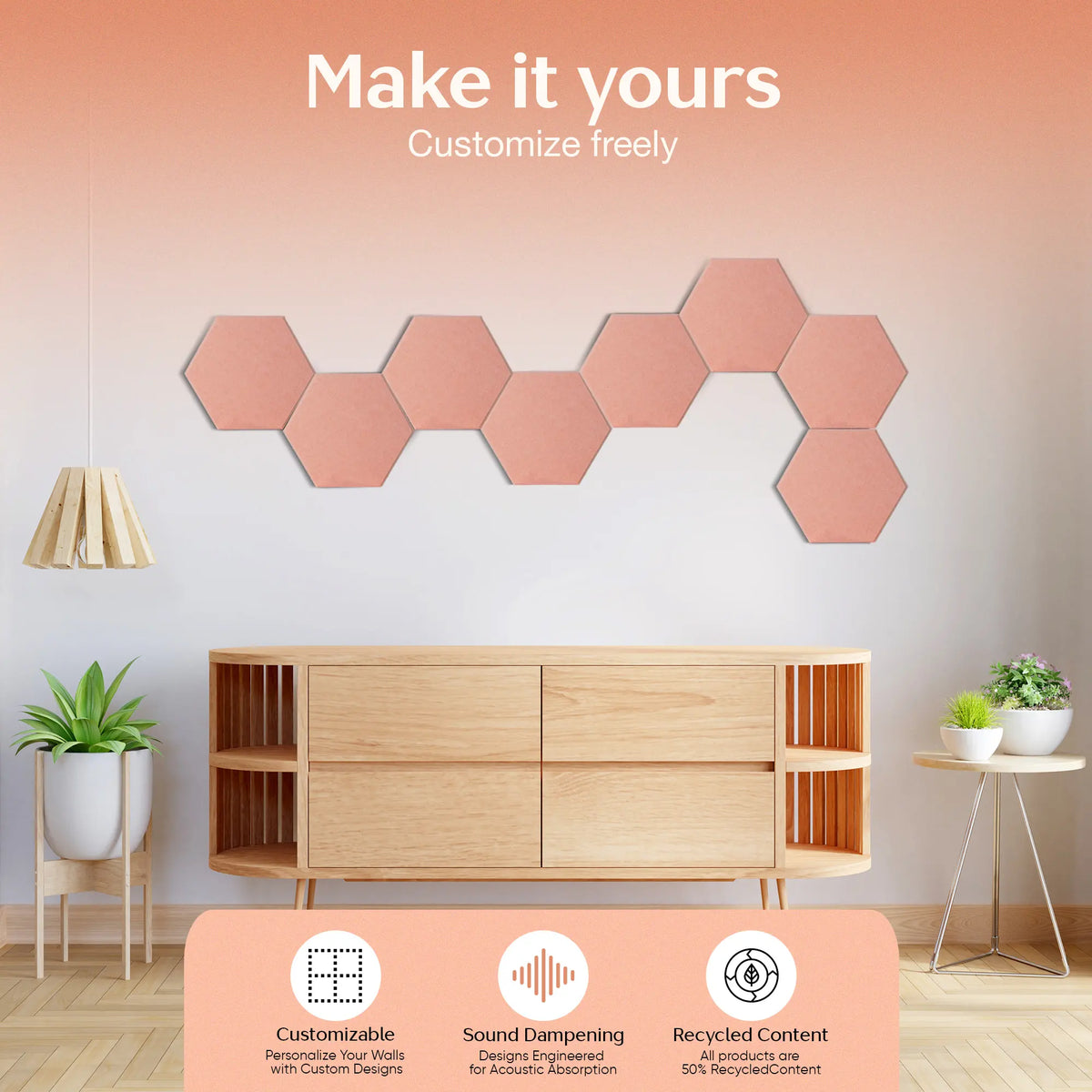 A set of personalized hexagonal acoustic wall panels in a dusty rose color, arranged in a curved line on a wall above a light wood credenza in a modern living room setting. Text overlays at the top read 'Make it yours Customize freely' and the bottom features feature icons and text for 'Customizable', 'Sound Dampening', and 'Recycled Content'.