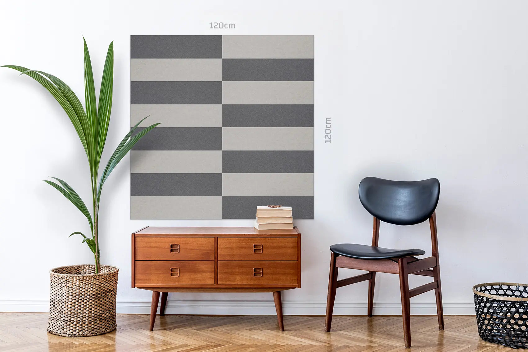 A large wall art print with a gray and beige checkerboard pattern is displayed in a styled room setting above a mid-century wooden sideboard, next to a black leather chair. The image includes dimension markers indicating a height and width of 120cm.