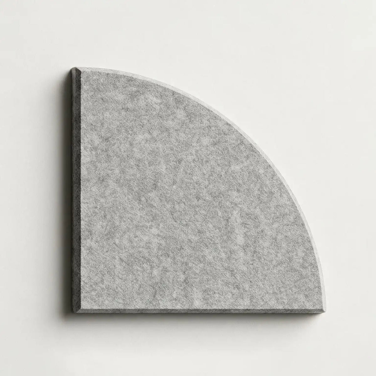 A square gray felt or fabric sample with rounded one corner, shown against a plain light background.