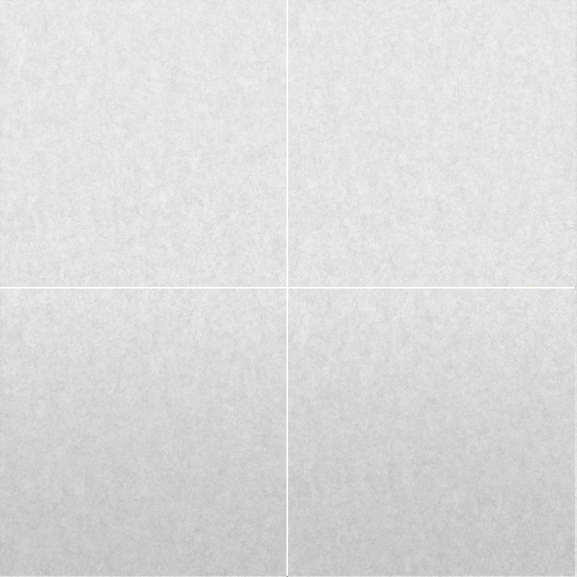 Four square white tiles arranged in a 2x2 grid with thin white grout lines.