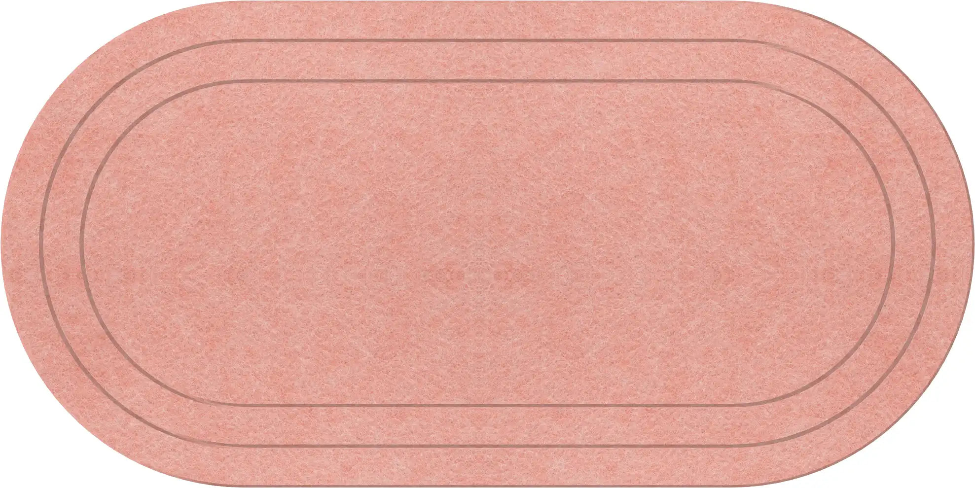 An oval-shaped runner rug in a coral color with a textured surface and two thin dark gray concentric lines.