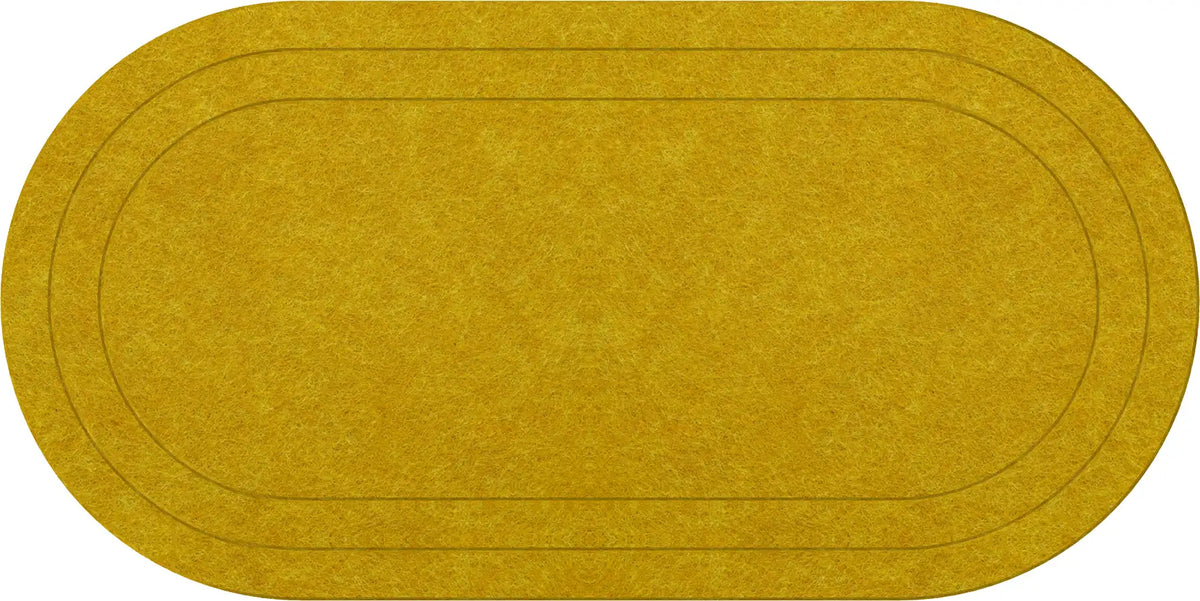 An oval area rug in a textured gold colour, featuring a subtle, darker-yellow, track-like oval border design.